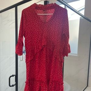 Polkadot mini babydoll dress with ruffle sleeves and hem details